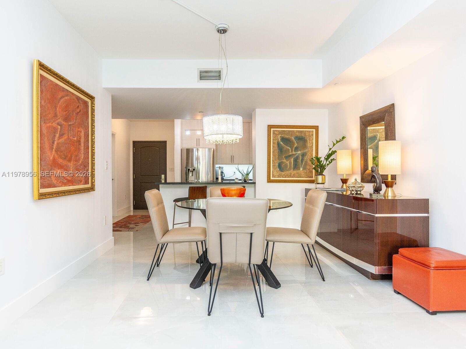 7350 Southwest 89th Street, Unit 719S Miami, FL 33156 - Photo 8 of 30 a dining room with furniture and window
