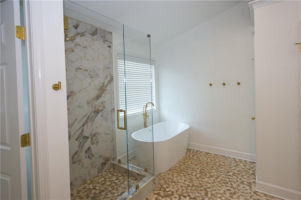 1481 Beckley Pointe Lawrenceville, GA 30043 - Photo 21 of 45 a bathroom with a shower