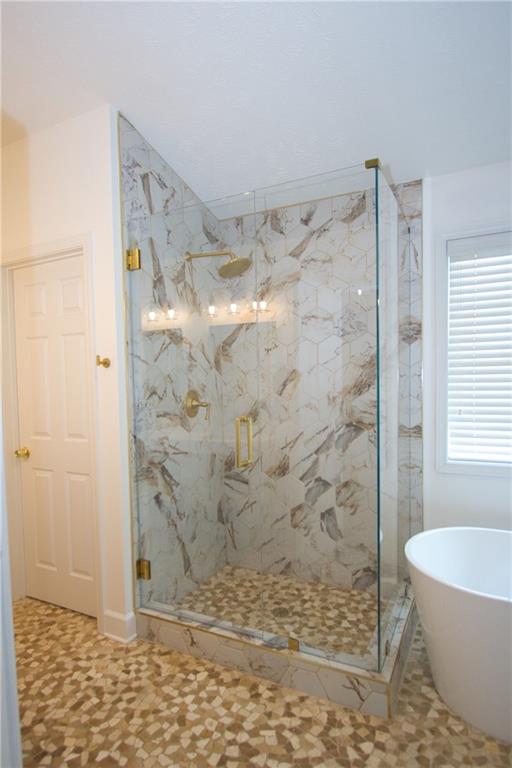 1481 Beckley Pointe Lawrenceville, GA 30043 - Photo 23 of 45 a bathroom with a shower