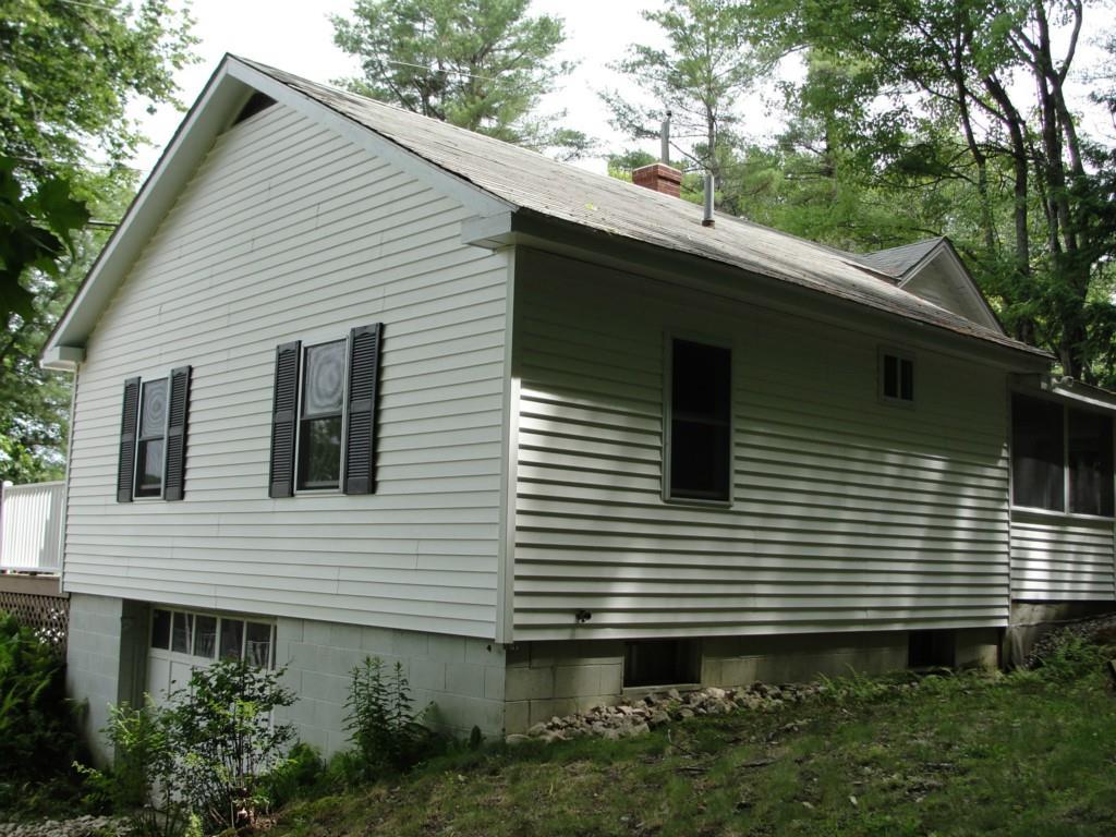 146 Brickyard Hill Road Bridgton, ME 04009 - Photo 7 of 28 Side view showing entry to garage.
