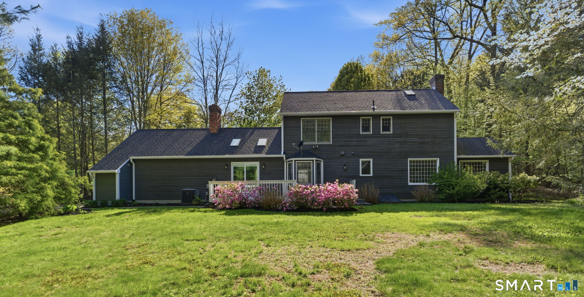 21 Greenwood Road North Granby, CT 06060 - Photo 32 of 40 a front view of house with garden