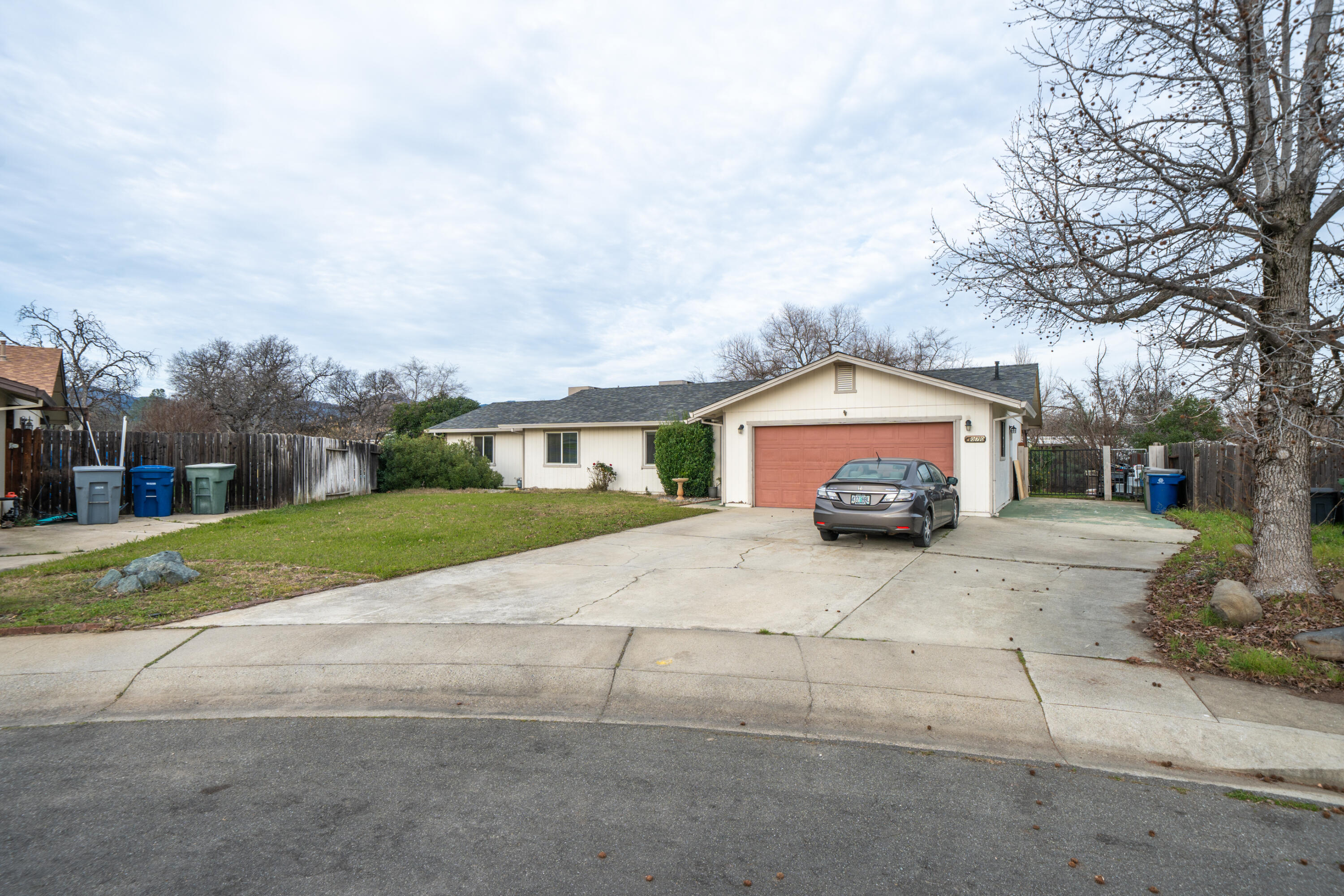 a view of house with outdoor space and street view