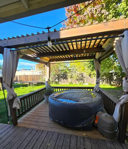 a view of balcony with wooden floor
