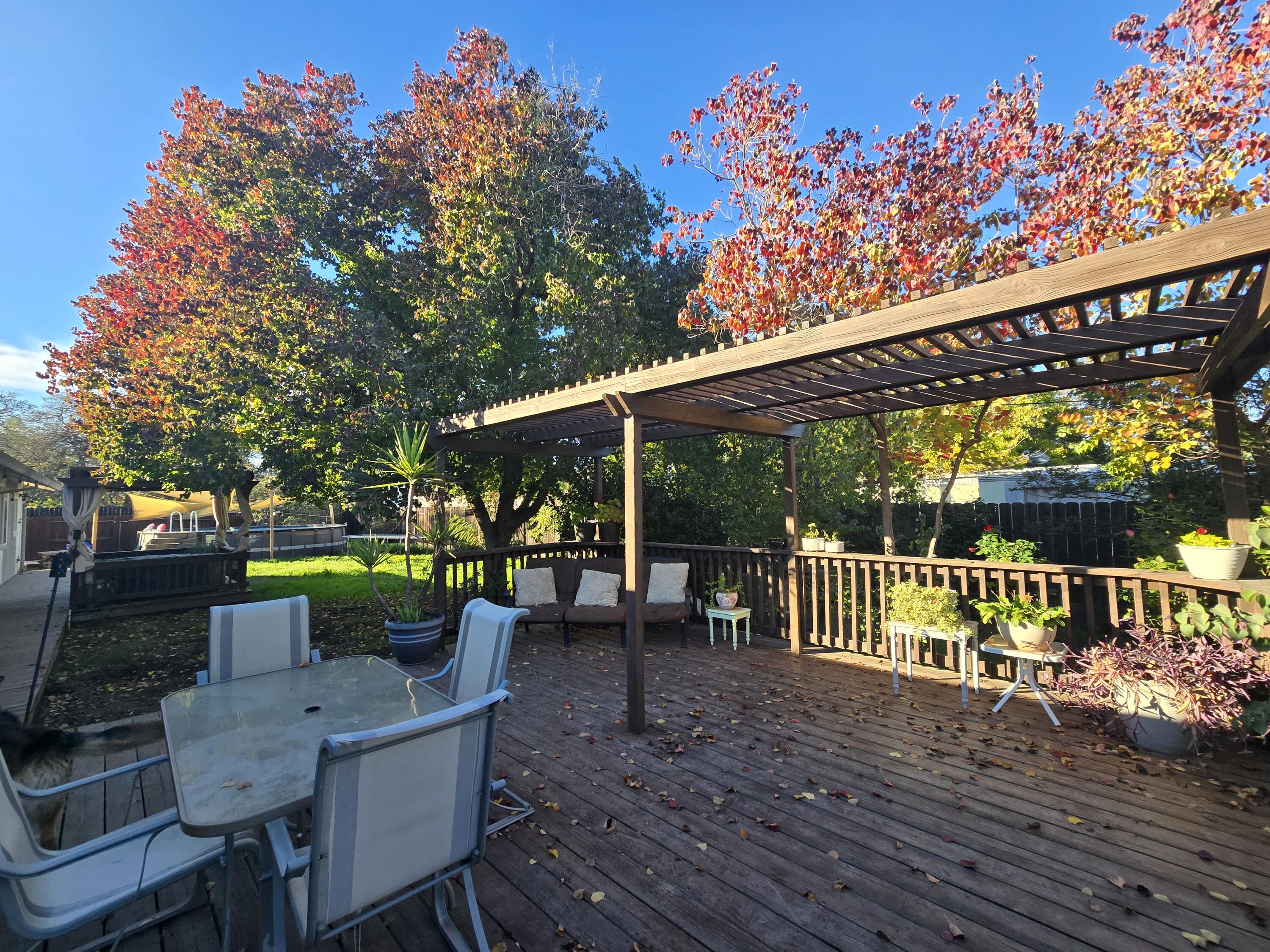 1070 Dara Court Redding, CA 96003 - Photo 52 of 66 a patio with table and chairs