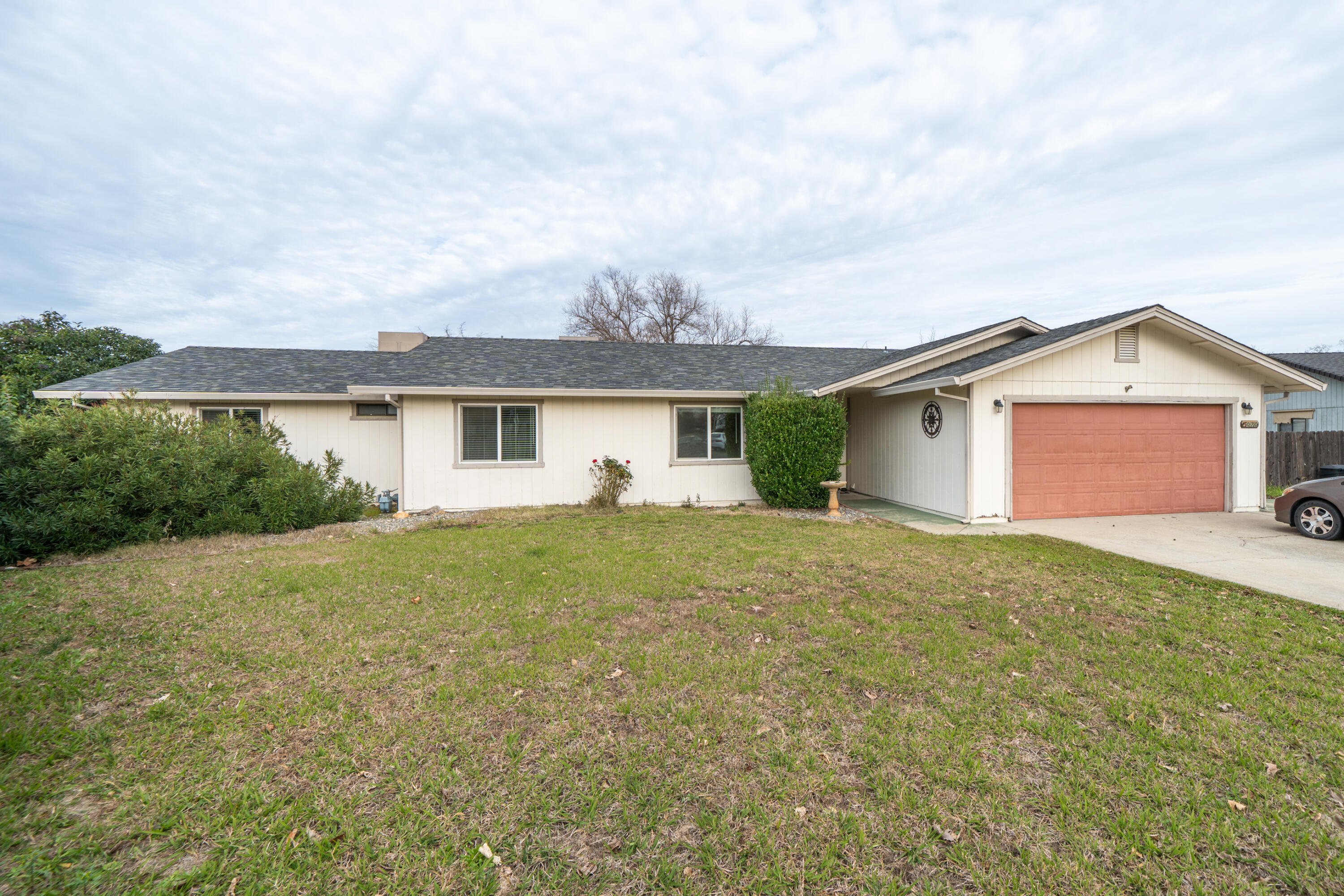 1070 Dara Court Redding, CA 96003 - Photo 55 of 66 front view of a house with a yard