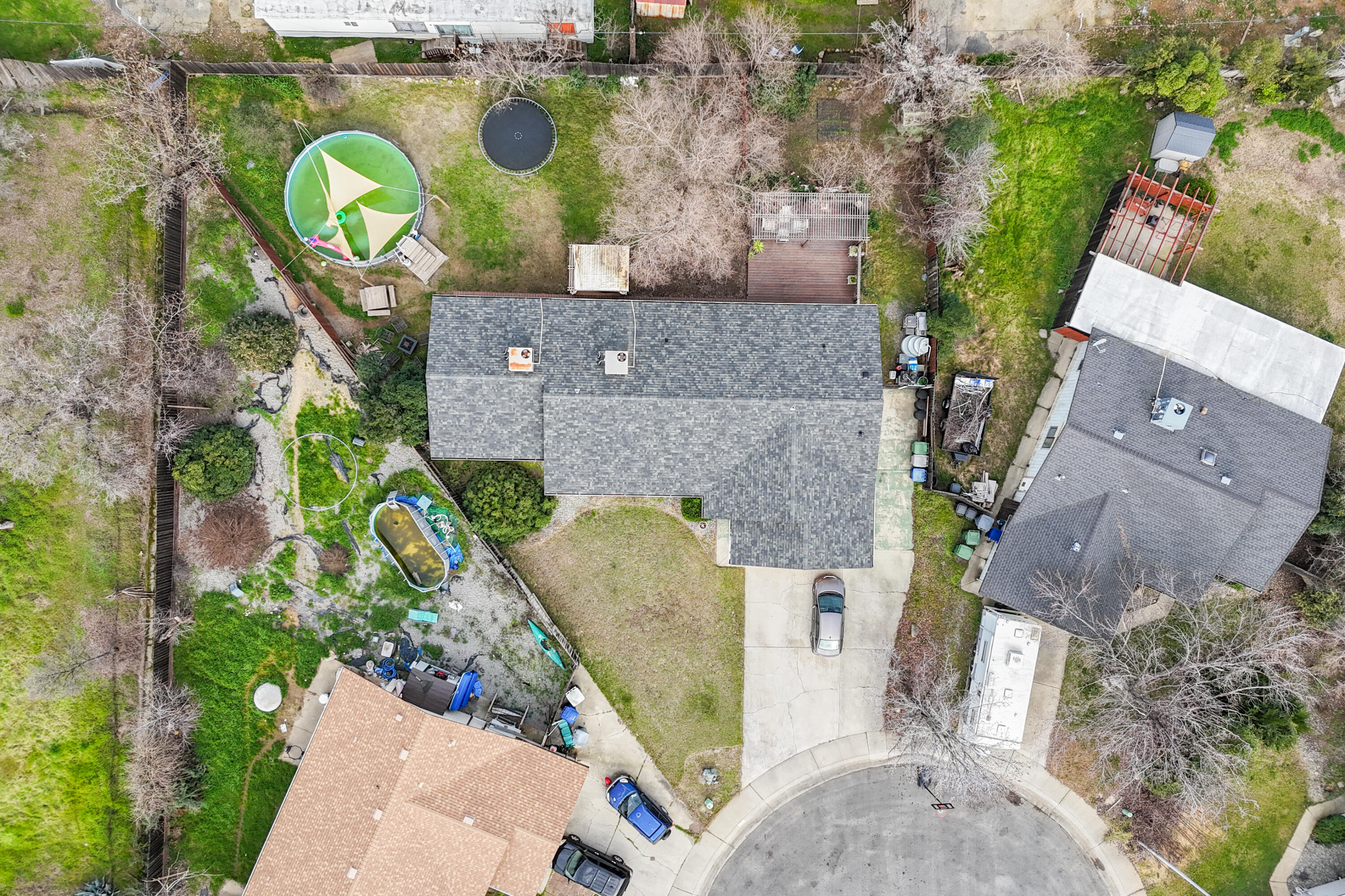 1070 Dara Court Redding, CA 96003 - Photo 66 of 66 an aerial view of a house with a swimming pool