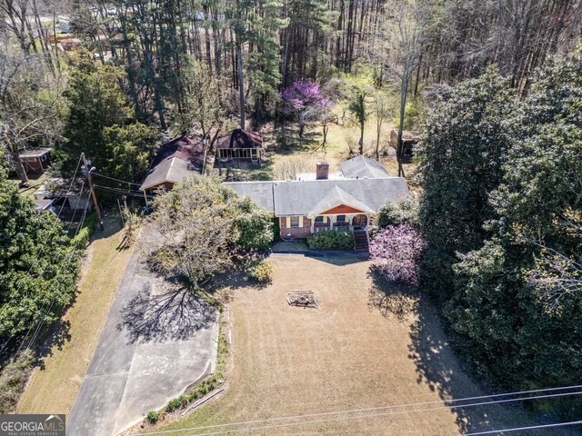 2218 Young Road Stone Mountain, GA 30088 - Photo 2 of 23 a view of a pathway both side of house
