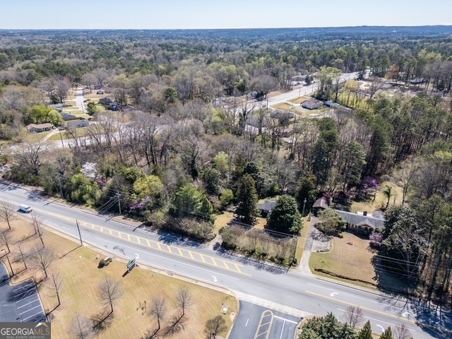 2218 Young Road Stone Mountain, GA 30088 - Photo 4 of 23 an aerial view of a house with a yard