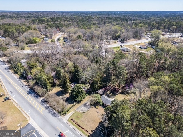 2218 Young Road Stone Mountain, GA 30088 - Photo 5 of 23 a view of a forest with a street