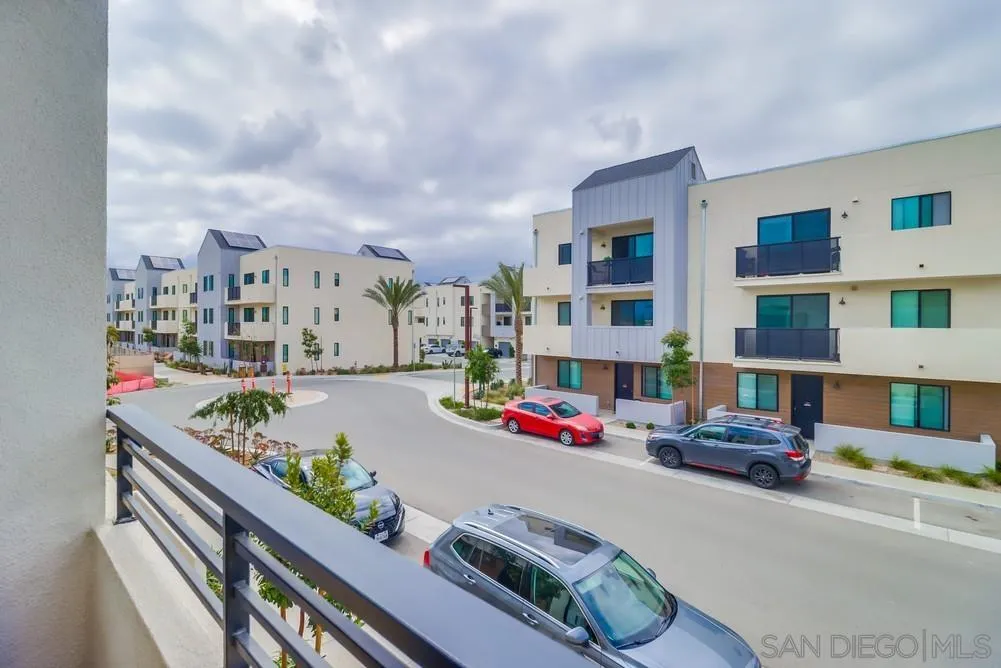 2408 Cascalote Loop San Diego, CA 92154 - Photo 24 of 50 a cars parked in front of building