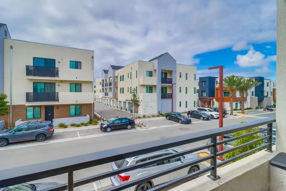 2408 Cascalote Loop San Diego, CA 92154 - Photo 25 of 50 a view of a living room with furniture and a table