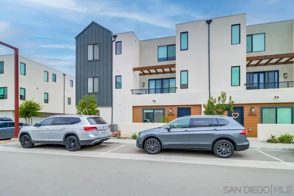 2408 Cascalote Loop San Diego, CA 92154 - Photo 3 of 50 a view of a cars parked in front of a house