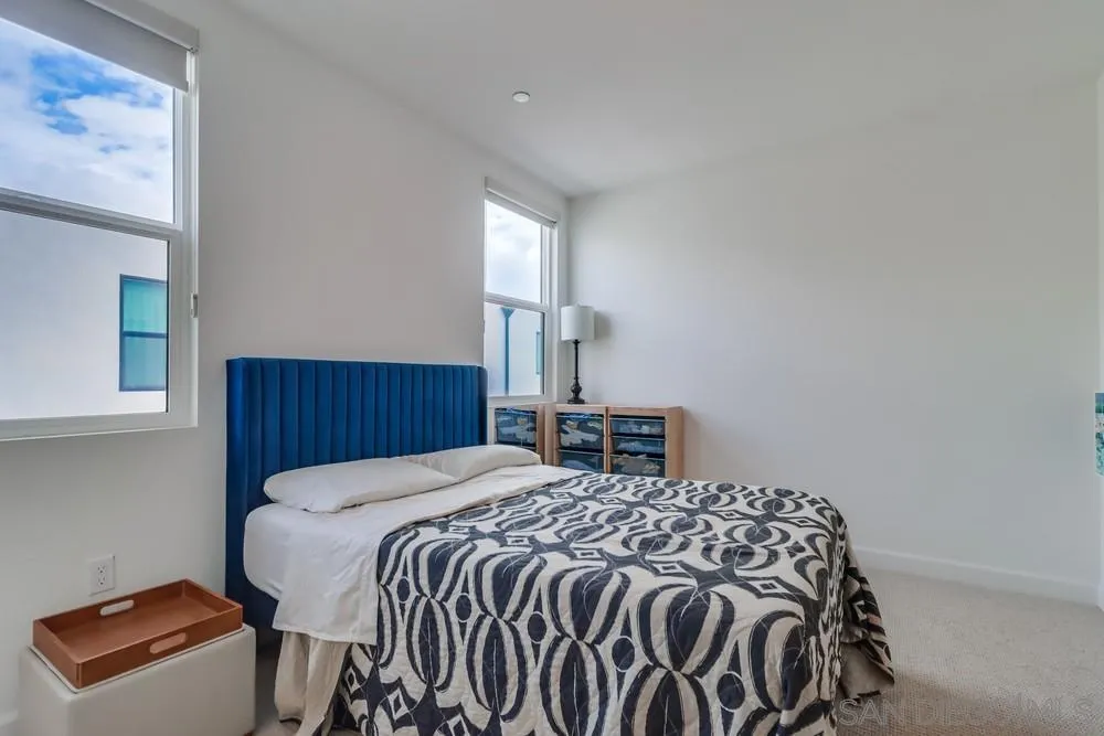 2408 Cascalote Loop San Diego, CA 92154 - Photo 39 of 50 a bed sitting in a bedroom next to a window