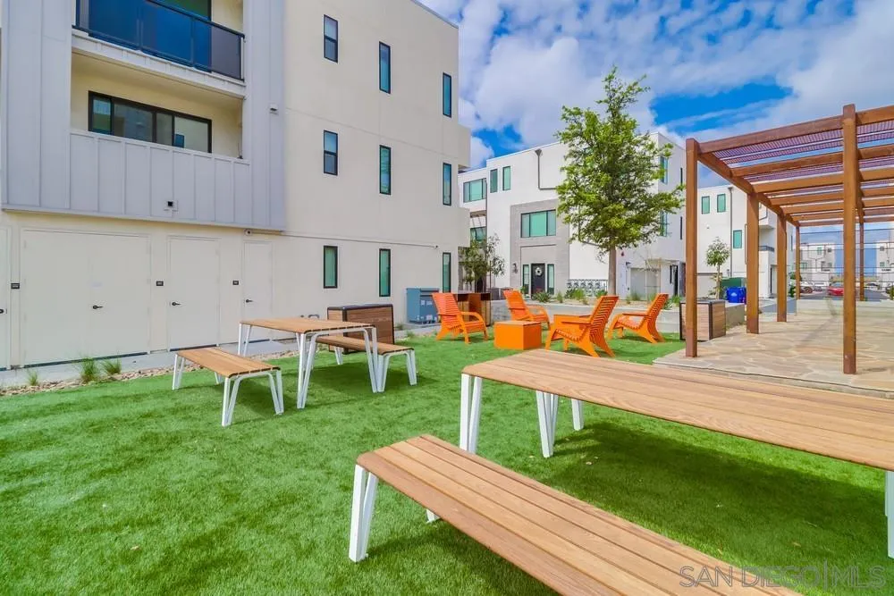 2408 Cascalote Loop San Diego, CA 92154 - Photo 43 of 50 a view of a house with backyard and sitting area