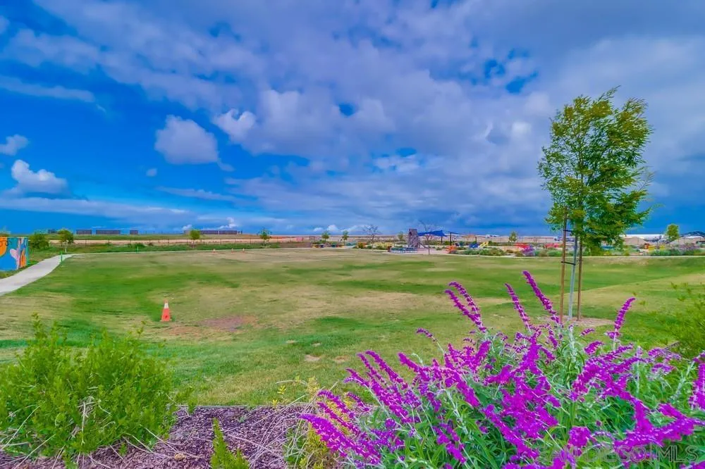 2408 Cascalote Loop San Diego, CA 92154 - Photo 46 of 50 a view of an outdoor space with a lake view