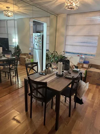 a view of a dining room with furniture