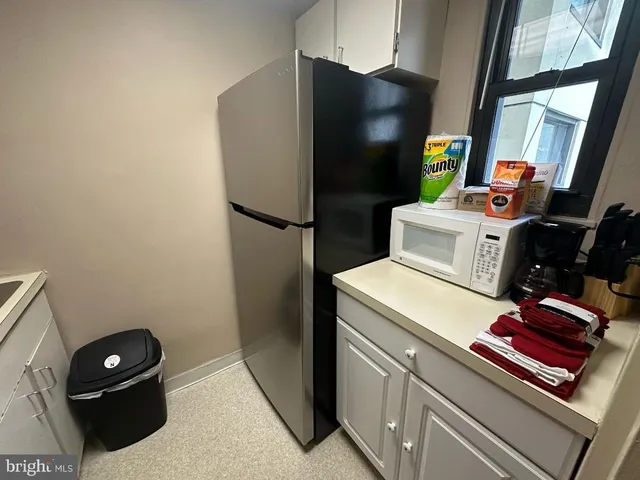 a bathroom with a toilet and a sink