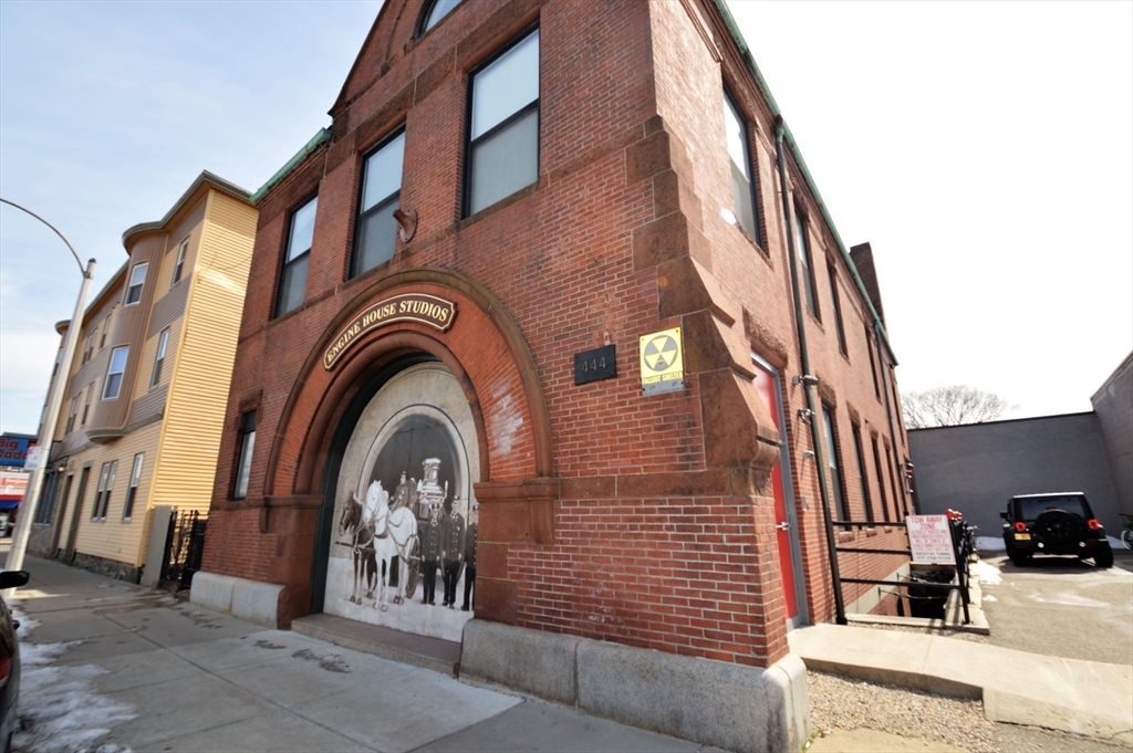 444 Western Avenue, Unit 3 Boston, MA 02135 - Photo 10 of 11 a view of a brick building with entryway windows