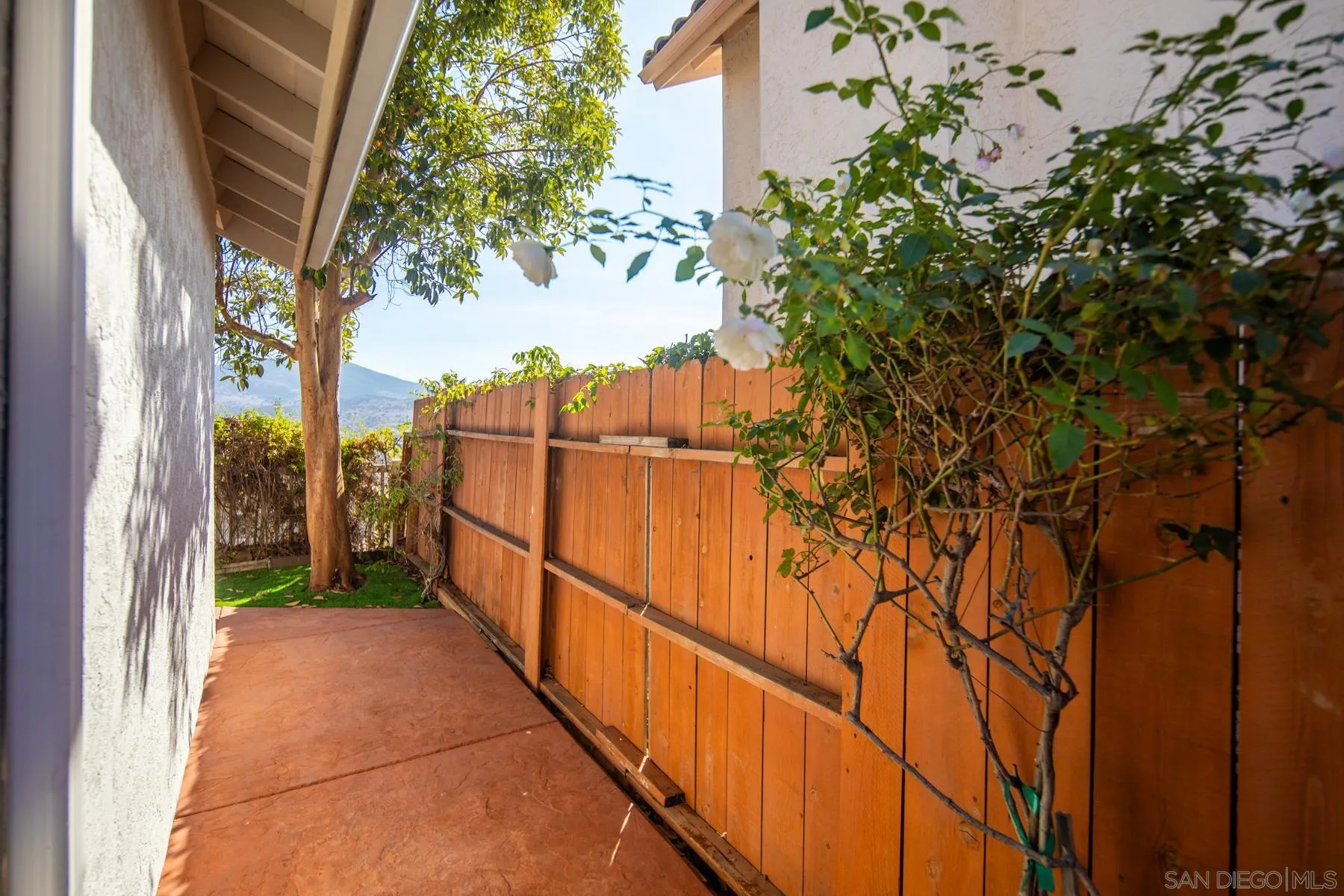 10167 Bluestone Court Spring Valley, CA 91977 - Photo 34 of 49 a view of a balcony with wooden fence and floor