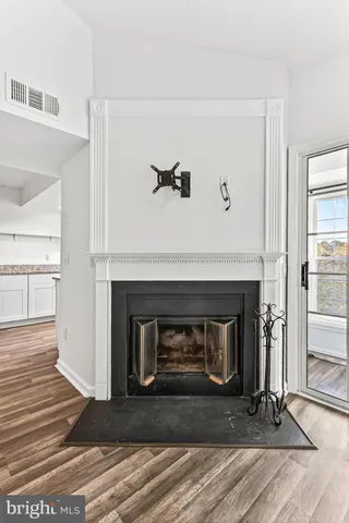 a living room with a fireplace