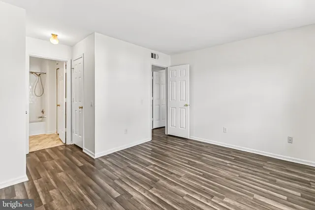 a bathroom with a sink toilet tub and shower