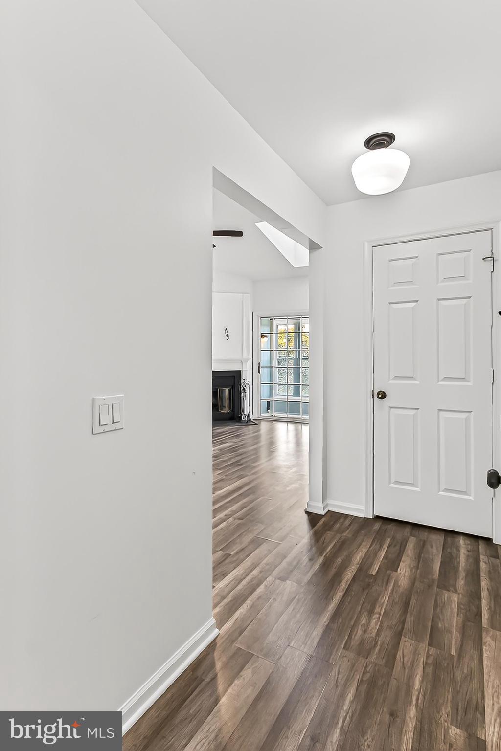 120 Prosperity Avenue Southeast, Unit E Leesburg, VA 20175 - Photo 4 of 34 a view of empty room with wooden floor