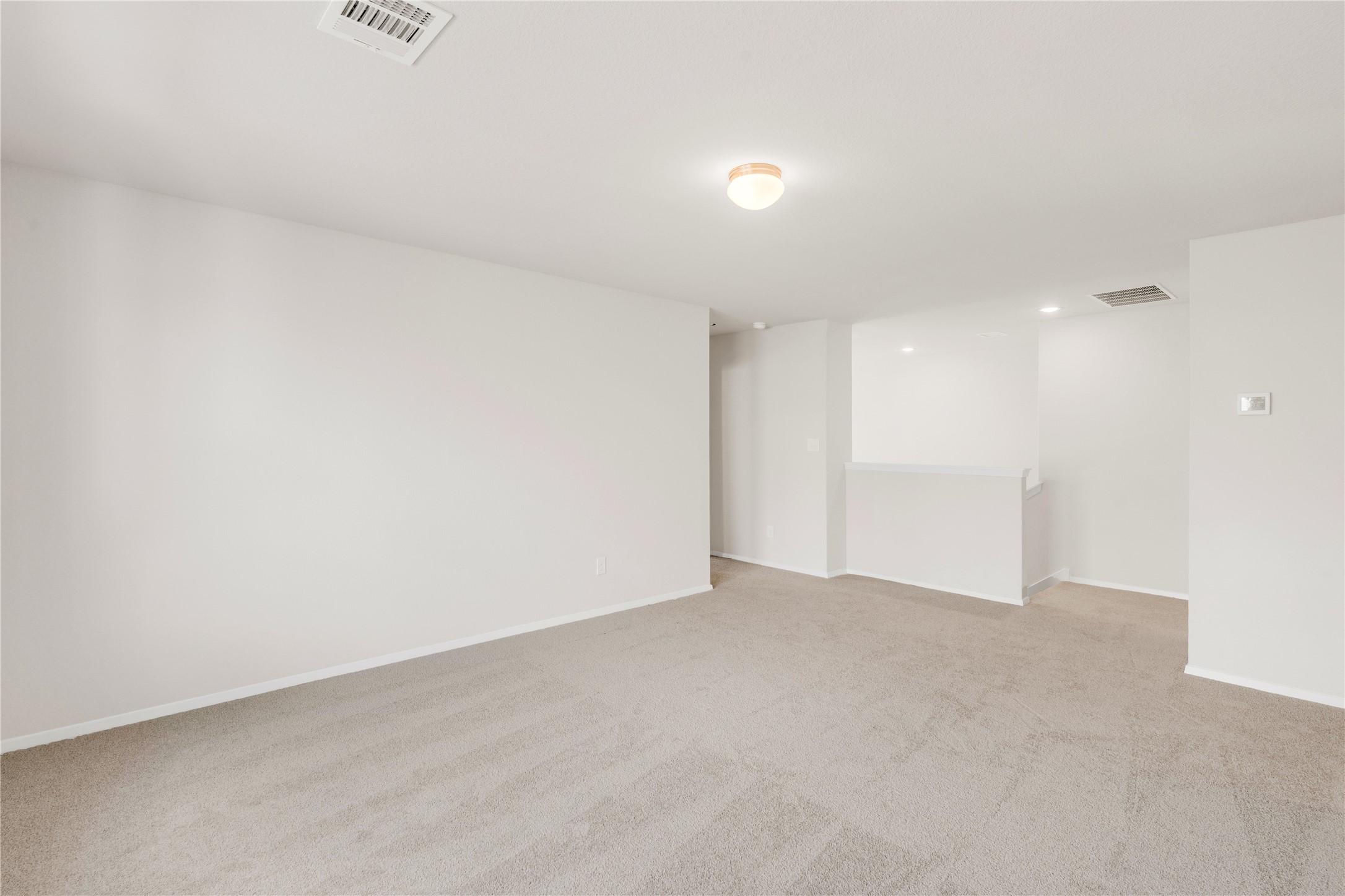 2615 Towy Road Manor, TX 78653 - Photo 20 of 38 Empty room featuring light colored carpet and baseboards