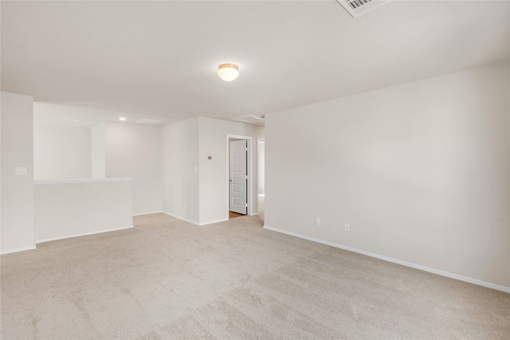 2615 Towy Road Manor, TX 78653 - Photo 21 of 38 Spare room featuring light colored carpet and baseboards