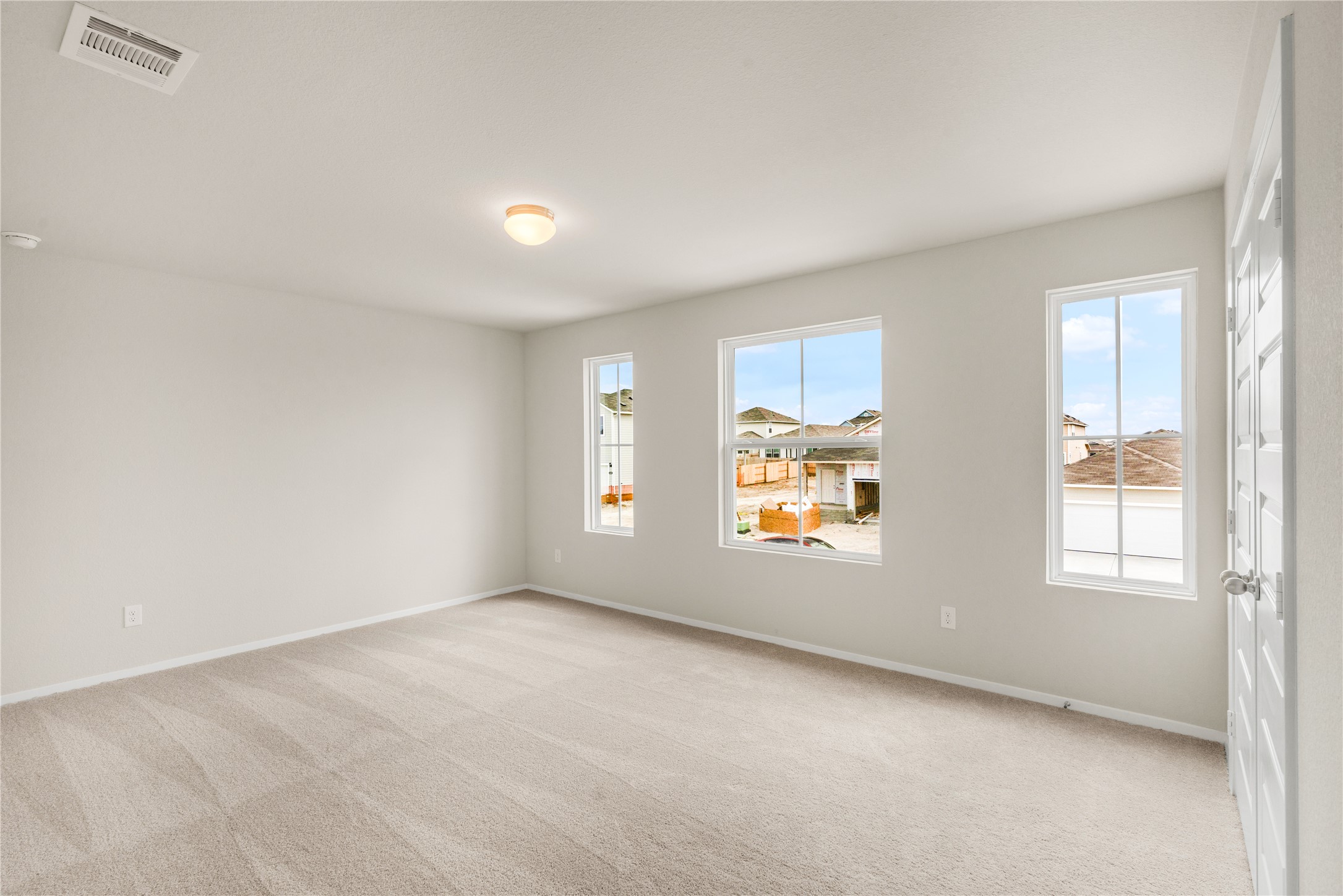 2615 Towy Road Manor, TX 78653 - Photo 23 of 38 Empty room featuring light carpet and baseboards