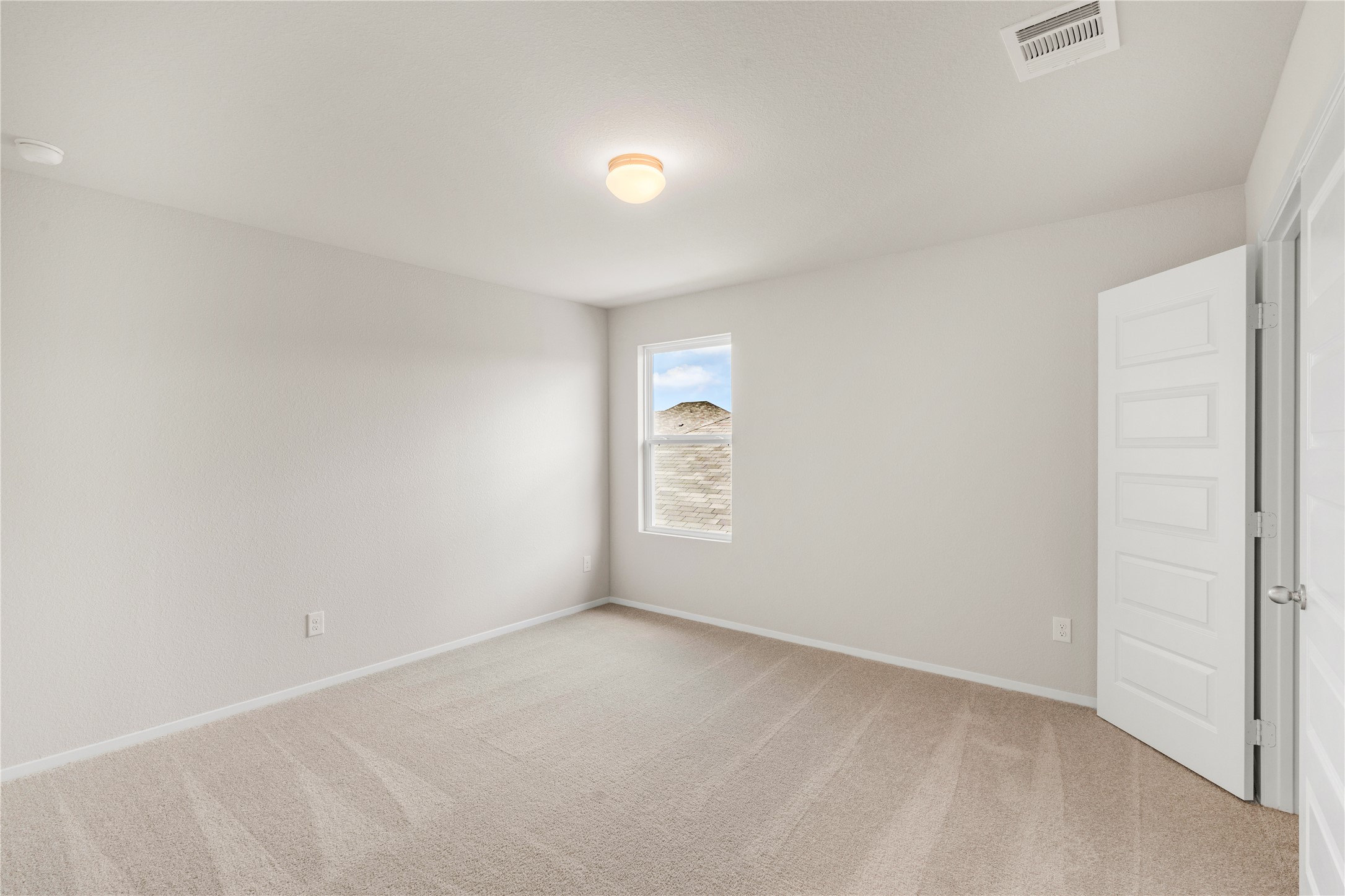 2615 Towy Road Manor, TX 78653 - Photo 26 of 38 Spare room with light colored carpet and baseboards