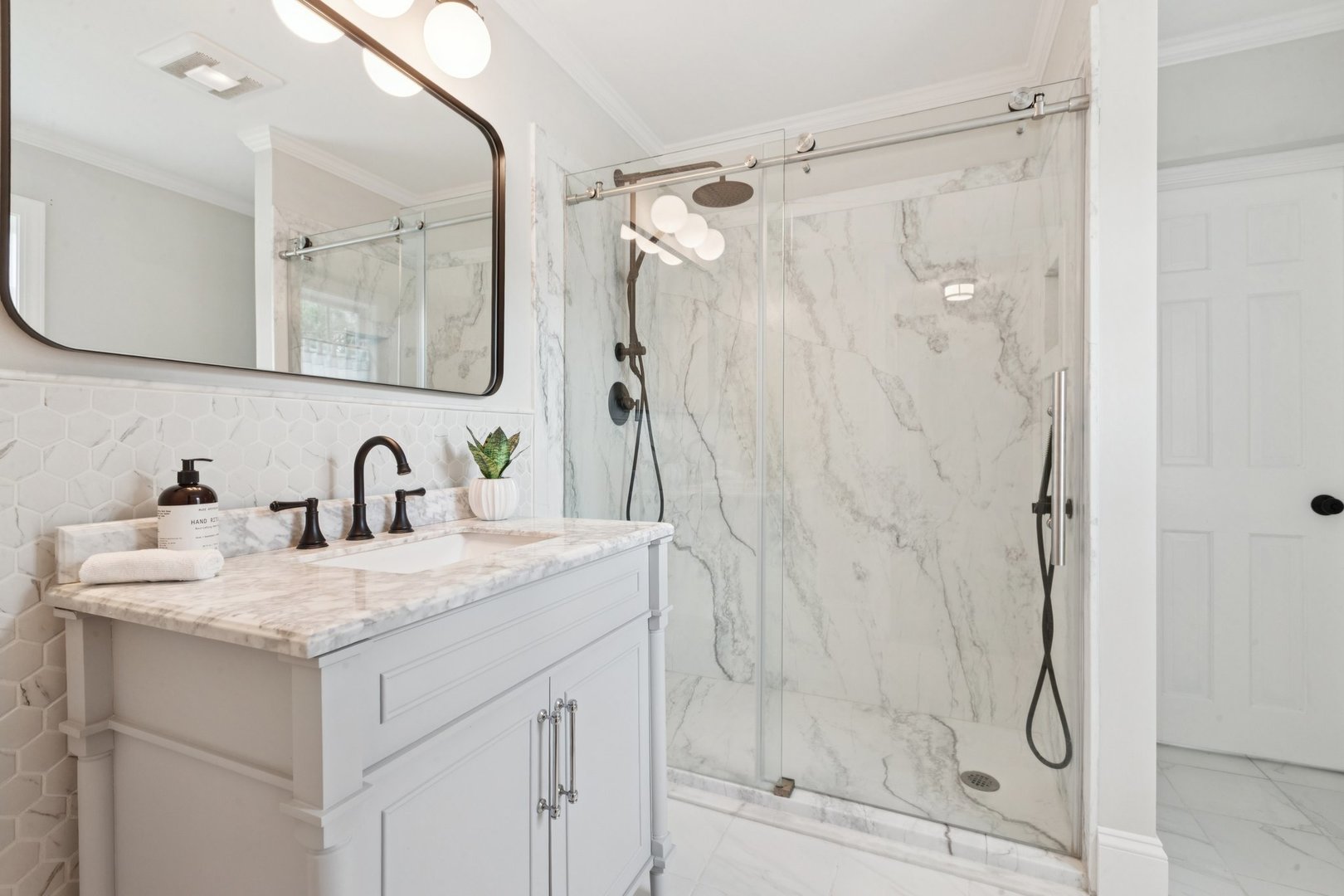 60 Ridge Road Barrington Hills, IL 60010 - Photo 34 of 70 a bathroom with a granite countertop sink mirror and shower
