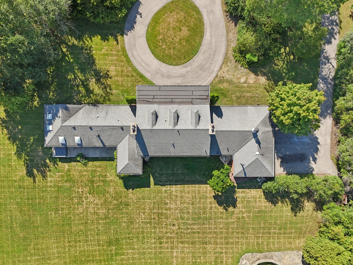 60 Ridge Road Barrington Hills, IL 60010 - Photo 64 of 70 an aerial view of a house with swimming pool and large trees