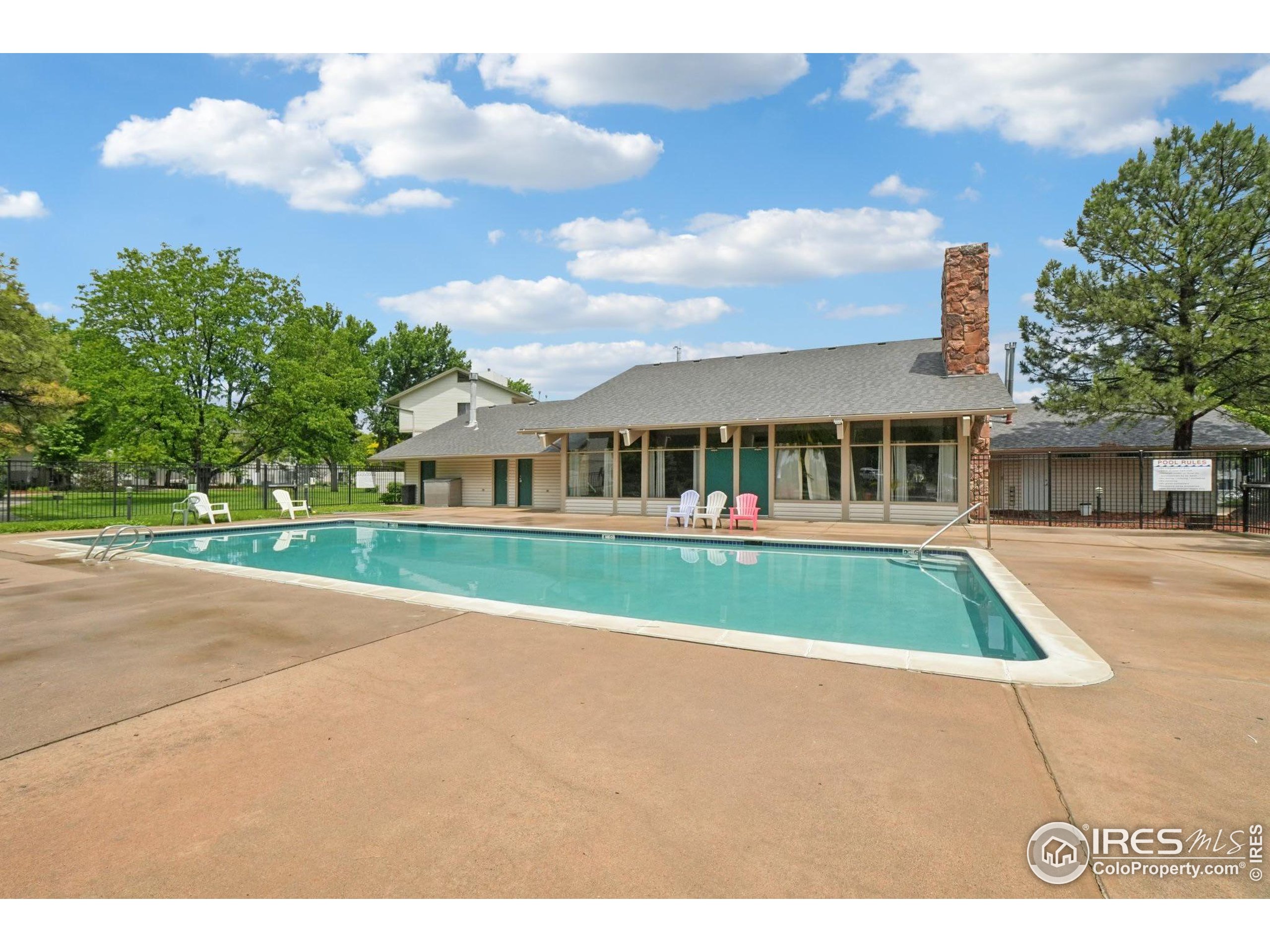 1705 Heatheridge Road, Unit G302 Fort Collins, CO 80526 - Photo 27 of 36 a view of house with yard