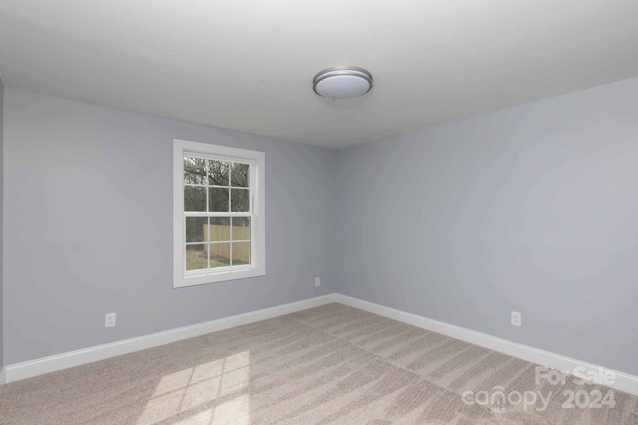 154 Brown Neal Road York, SC 29745 - Photo 12 of 24 an empty room with a window