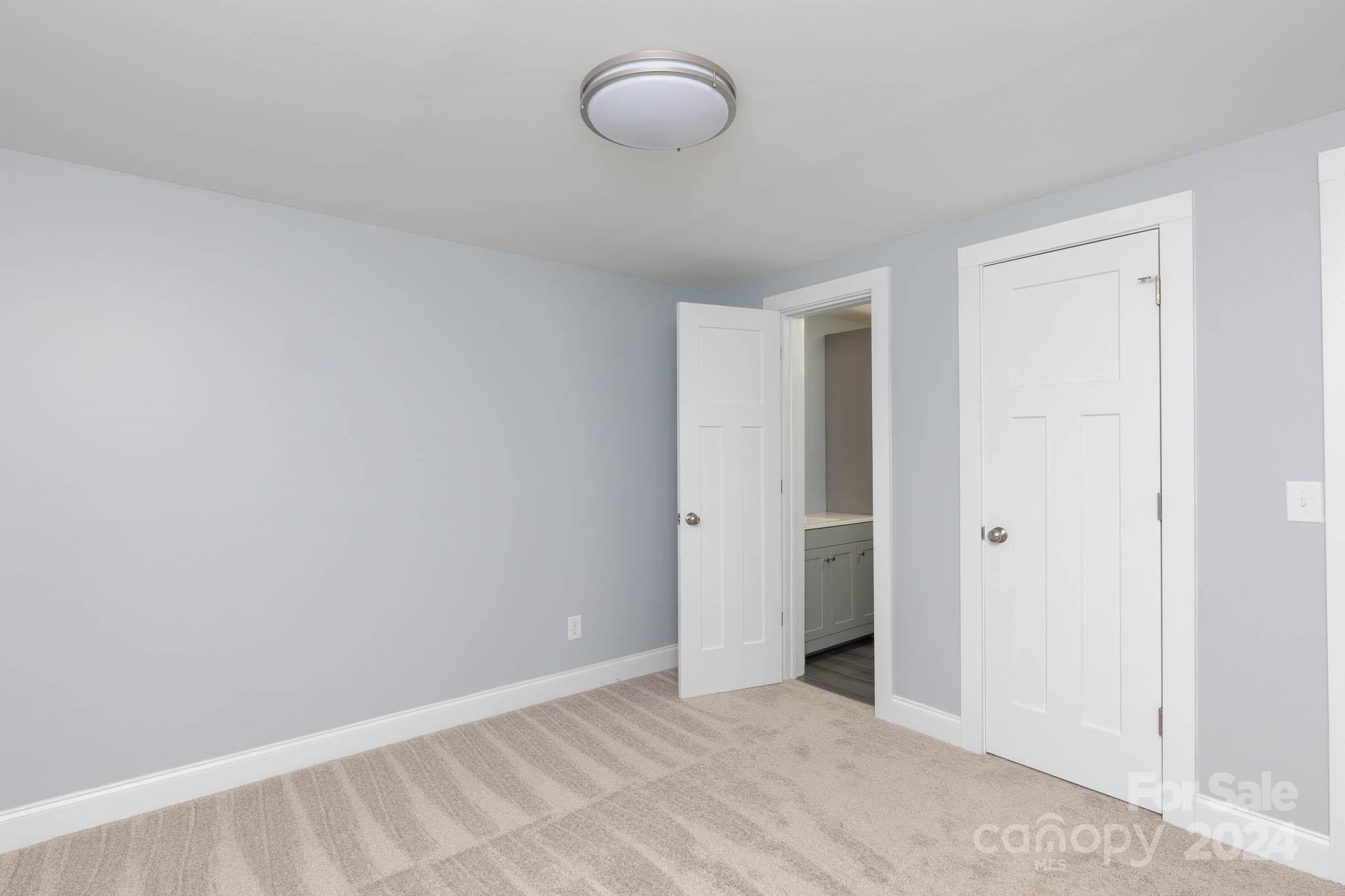 154 Brown Neal Road York, SC 29745 - Photo 13 of 24 a view of a room with racks on the wall