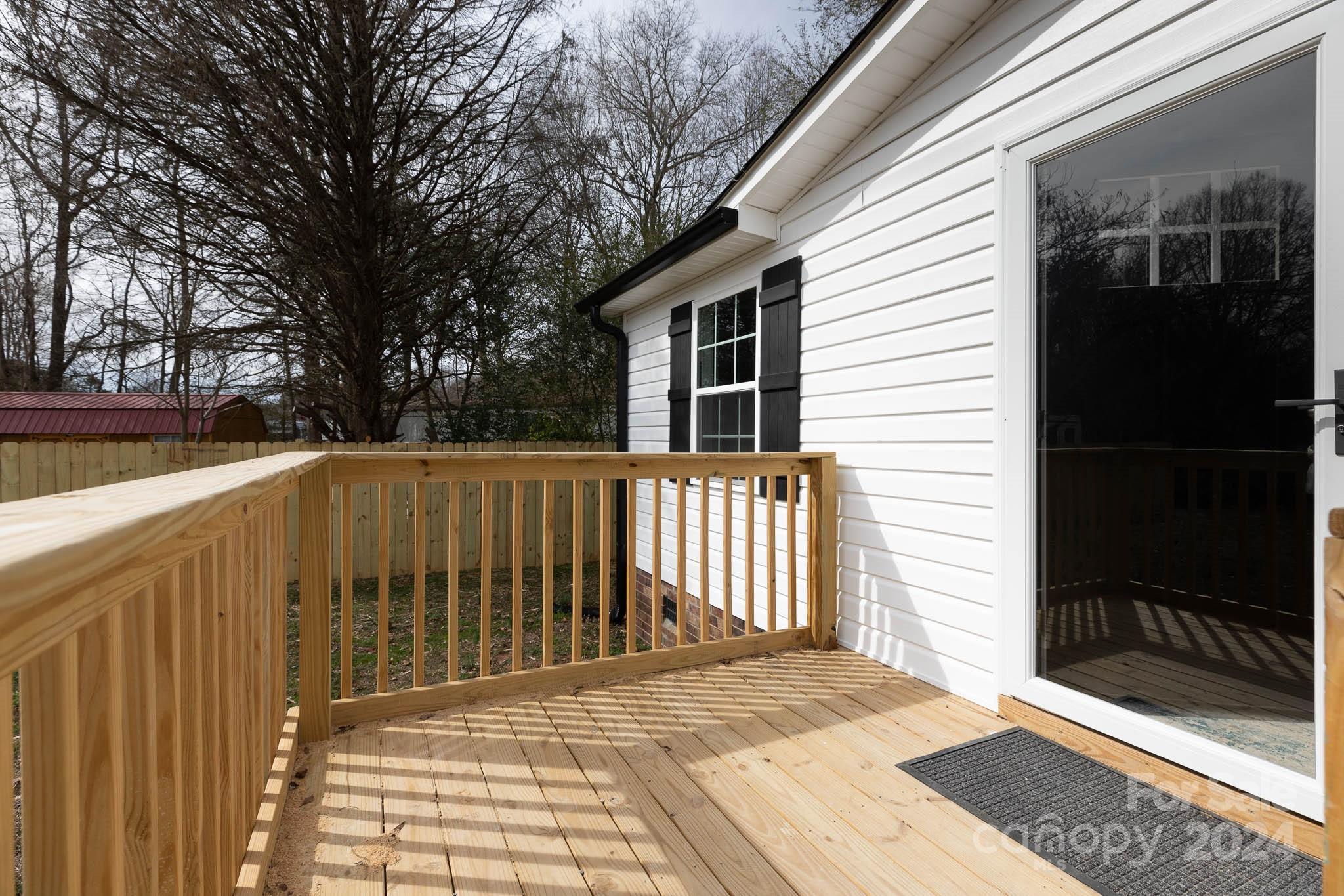 154 Brown Neal Road York, SC 29745 - Photo 24 of 24 a view of a wooden house and a yard