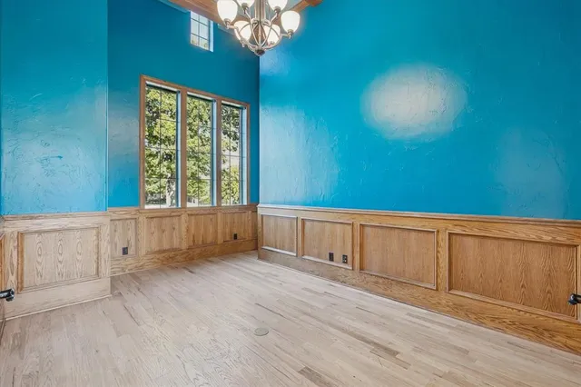 a living room with fireplace furniture and a flat screen tv