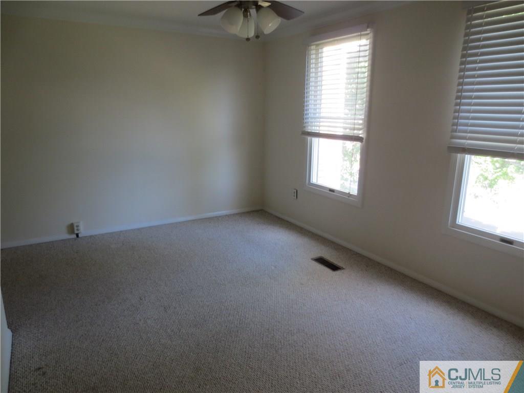 675 Bound Brook Road, Unit 23 Dunellen, NJ 08812 - Photo 20 of 26 an empty room with a window
