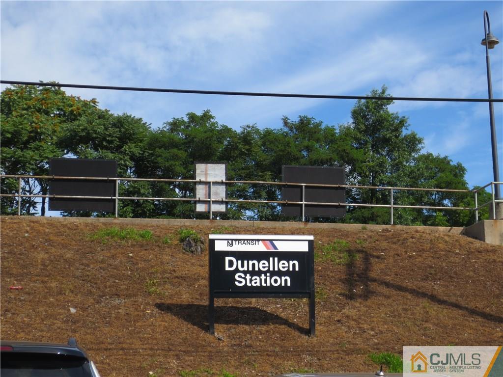 675 Bound Brook Road, Unit 23 Dunellen, NJ 08812 - Photo 22 of 26 a view of a street with a park