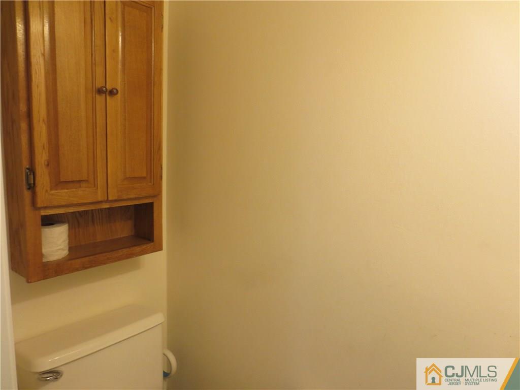 675 Bound Brook Road, Unit 23 Dunellen, NJ 08812 - Photo 25 of 26 a bathroom with a shower