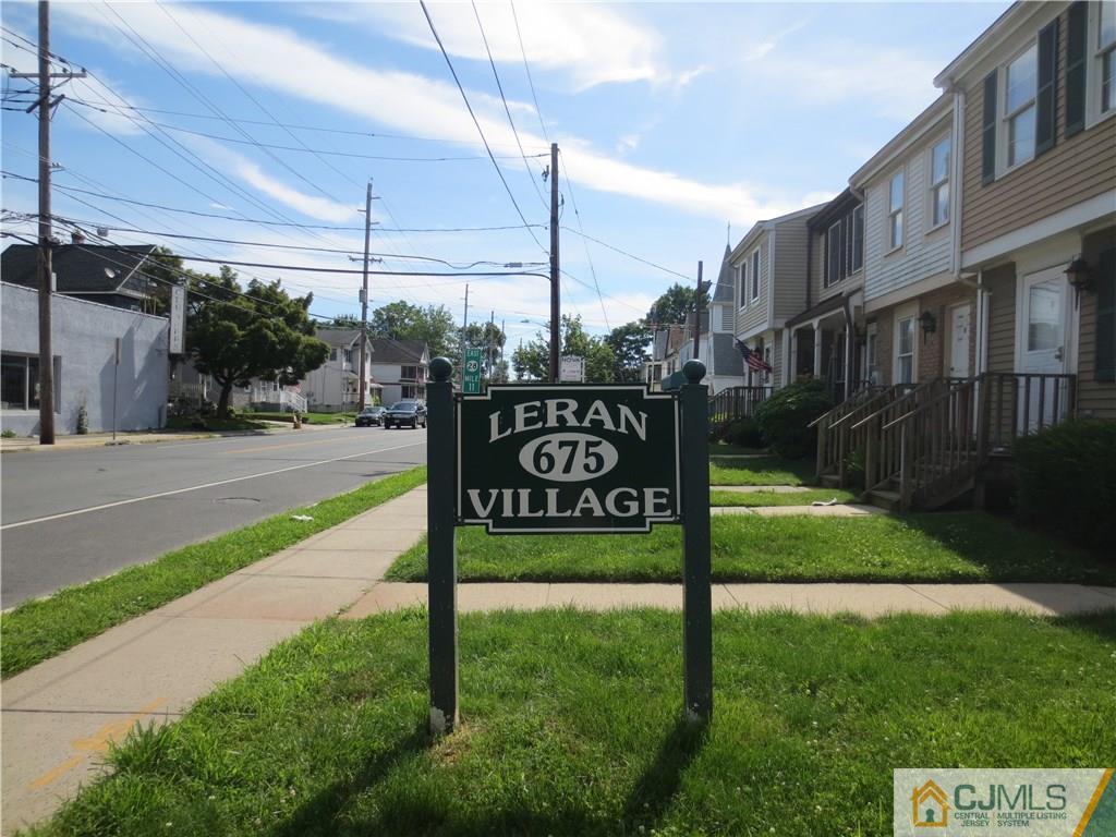675 Bound Brook Road, Unit 23 Dunellen, NJ 08812 - Photo 4 of 26 a view of a street sign of a building