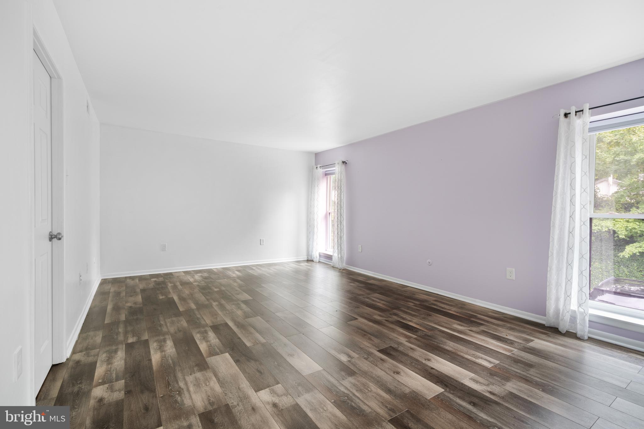 233 Township Line Road, Unit 5F Elkins Park, PA 19027 - Photo 20 of 25 a view of an empty room and window