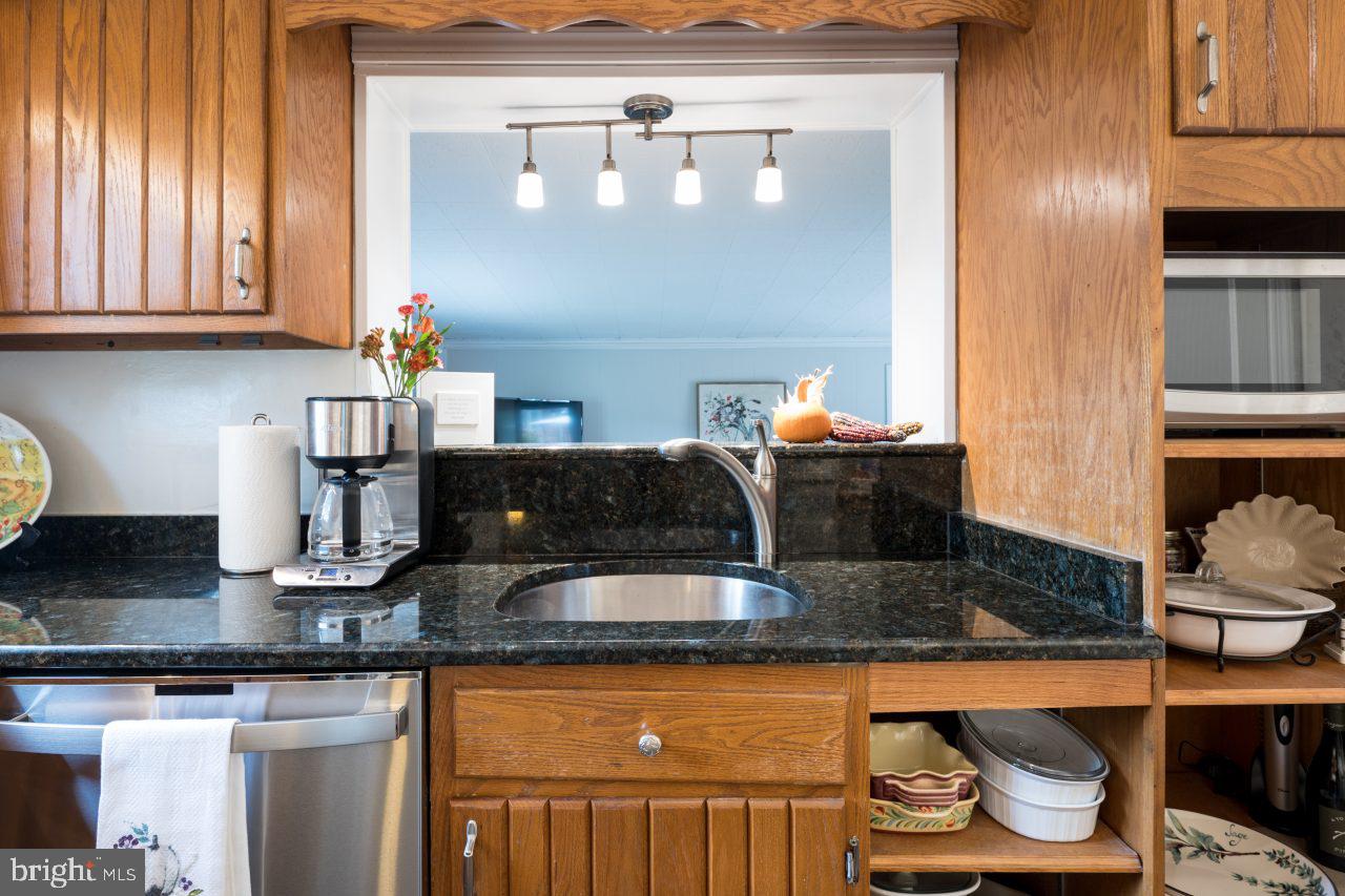 8007 Jackson Road Alexandria, VA 22308 - Photo 15 of 49 Granite on the pass-through to the family room