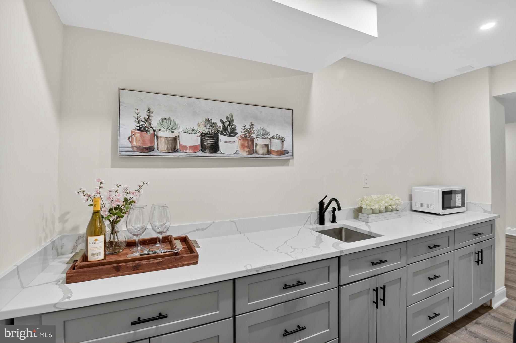2215 Reedie Drive Wheaton, MD 20902 - Photo 13 of 22 Modern kitchen with stylish decor.