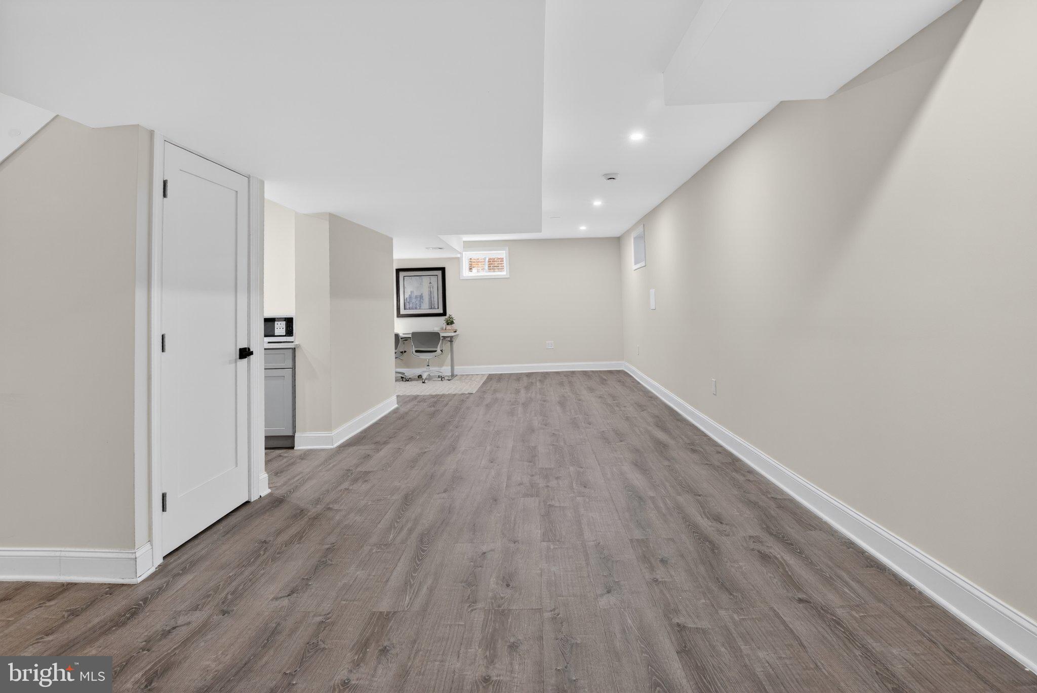 2215 Reedie Drive Wheaton, MD 20902 - Photo 15 of 22 Spacious, versatile basement retreat.
