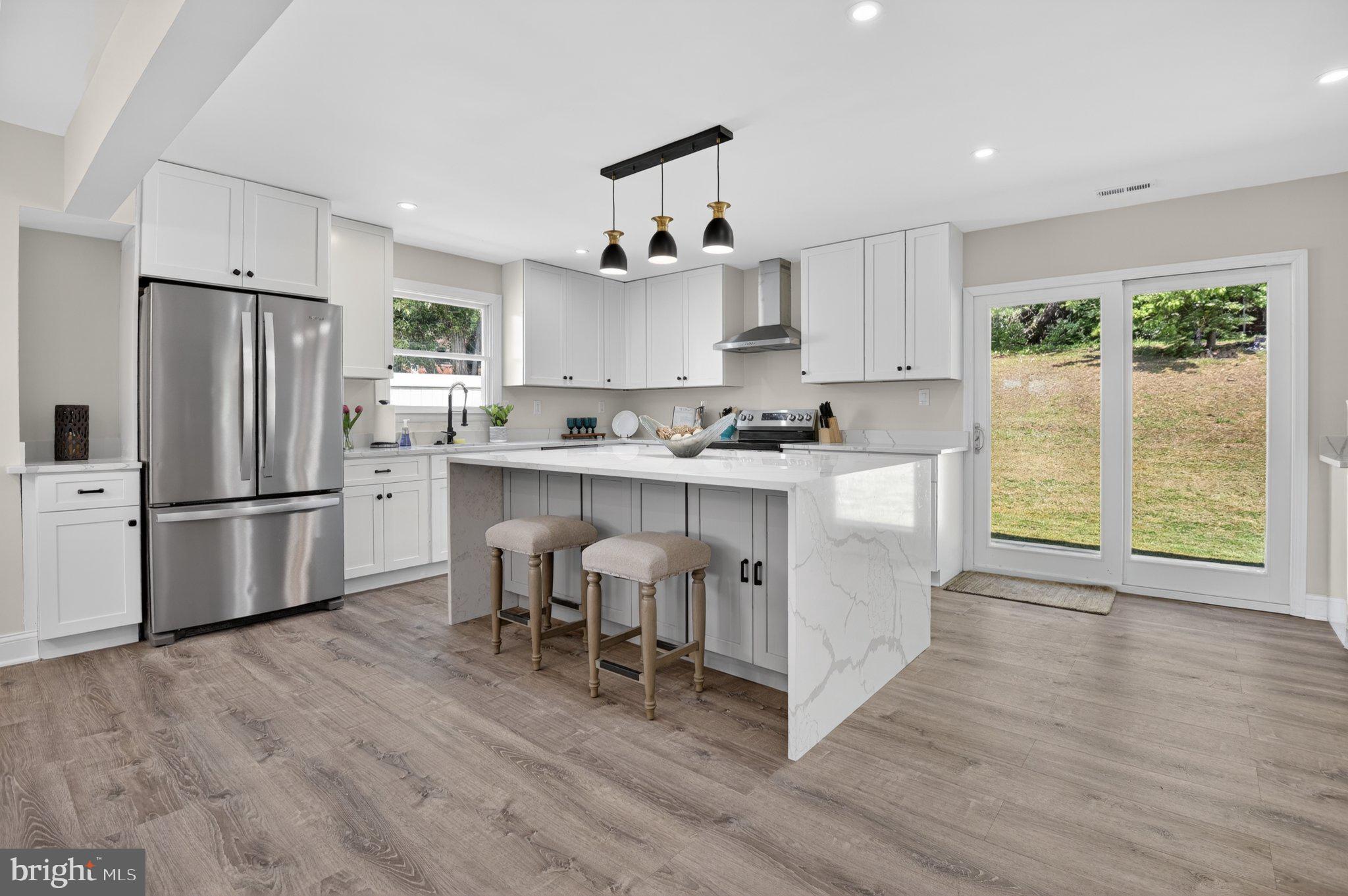 2215 Reedie Drive Wheaton, MD 20902 - Photo 3 of 22 Modern kitchen with natural light.