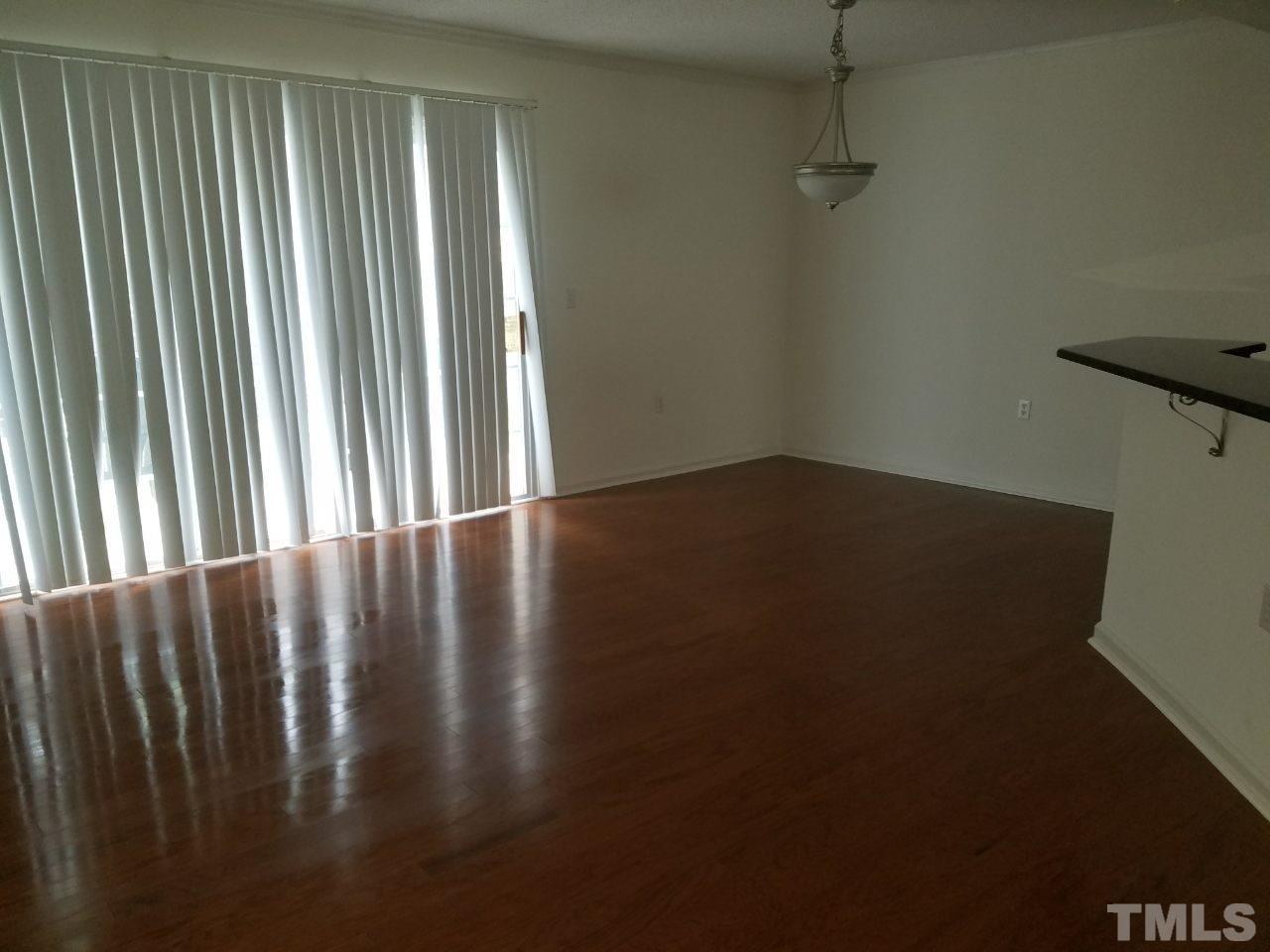 7712 Falcon Rest Circle, Unit 7712 Raleigh, NC 27615 - Photo 13 of 17 a view of wooden floor