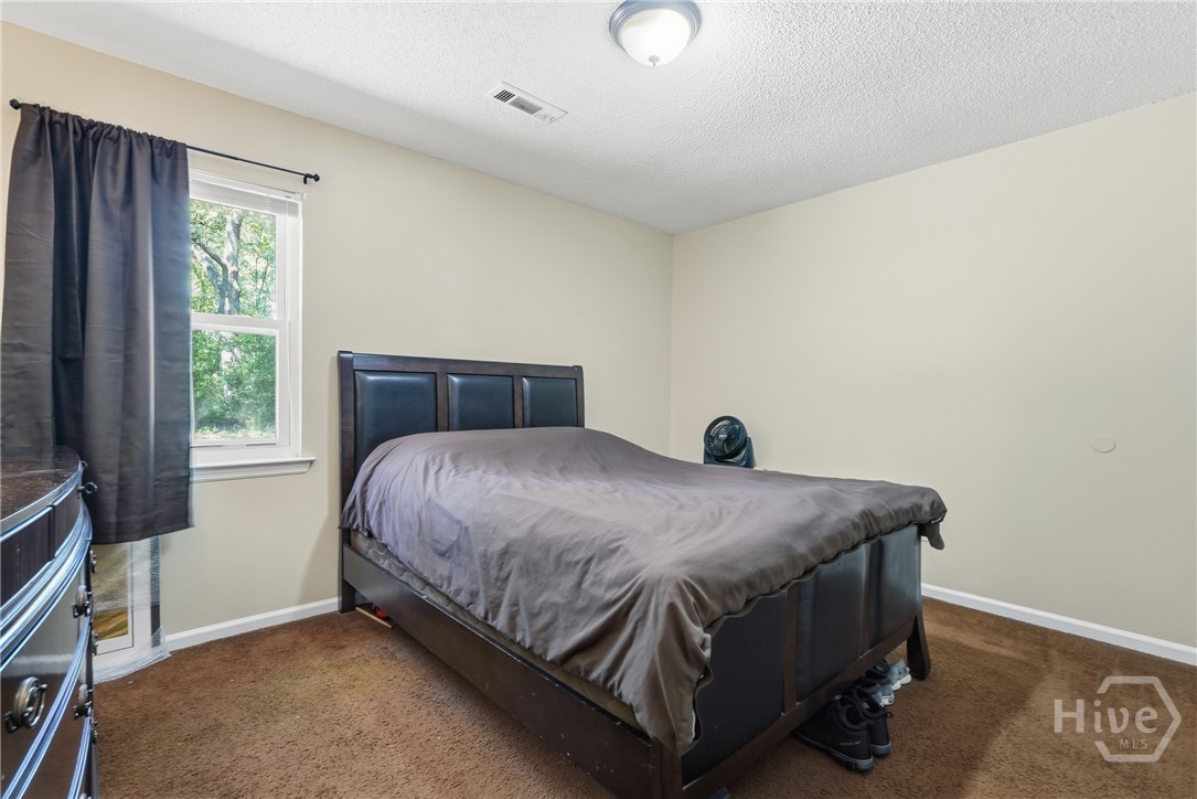 1014 Ash St Extension Springfield, GA 31329 - Photo 21 of 26 Primary bedroom