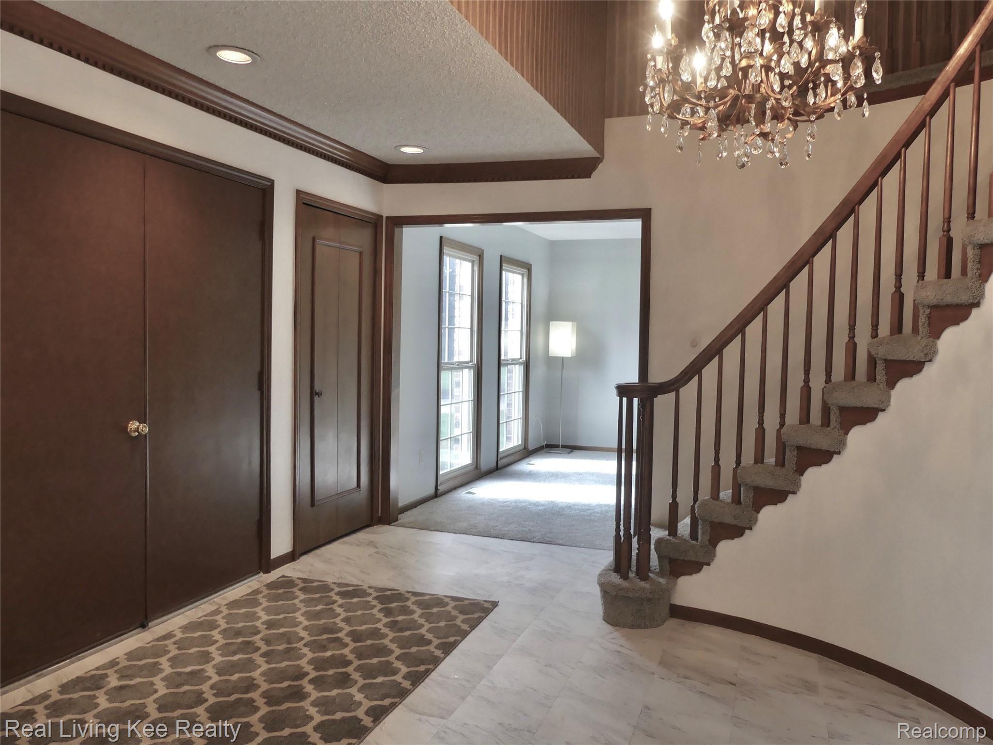 5118 Aintree Road Rochester, MI 48306 - Photo 15 of 47 Spacious foyer with spiral staircase