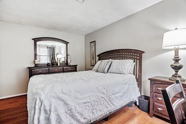 25 Osborne Street Lynn, MA 01905 - Photo 18 of 40 a bedroom with a bed and a mirror